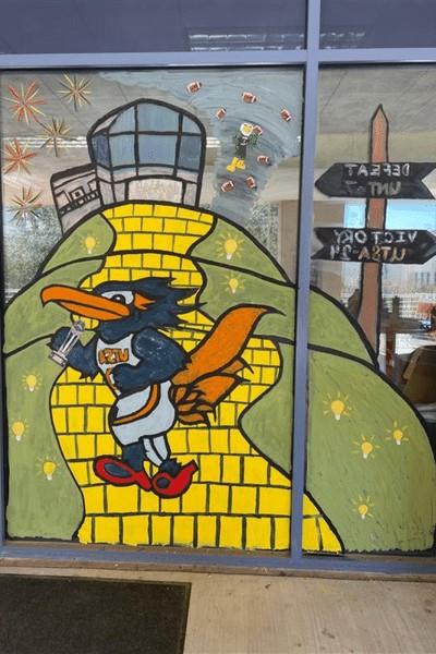 2022 Office Decorating Winner - classic Rowdy mascot along yellow brick road with union in background